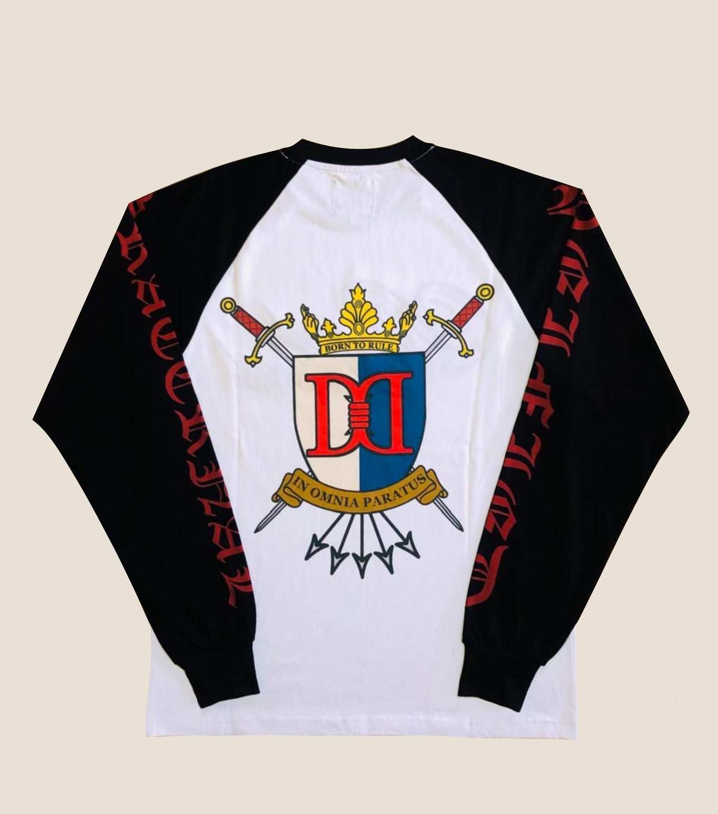 Long-sleeve shirt with a crest design on a beige background